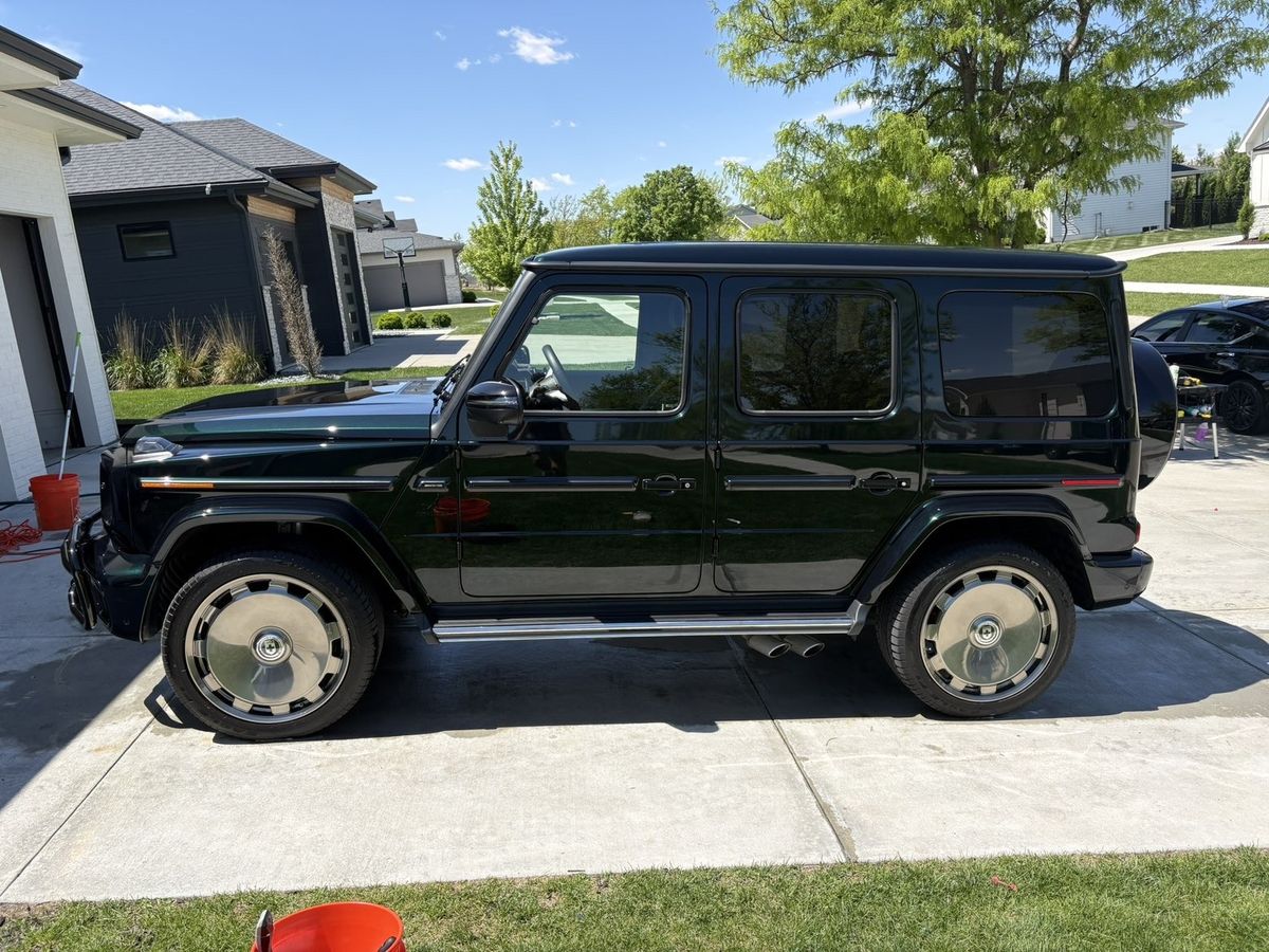 Side profile of detailed Mercedes G63 G-Wagon with chrome wheels